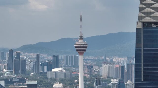 day time flight over kuala lumpur city downtown famous tower view point exterior aerial panorama 4k malaysia  