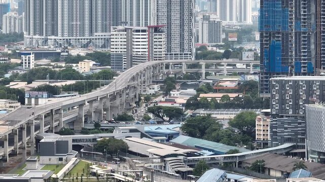 day time kuala lumpur city traffic crossroad overpass aerial panorama 4k malaysia  