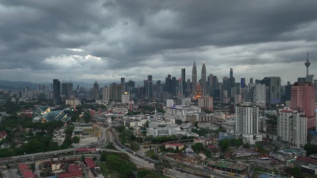 cloudy evening illumination kuala lumpur city downtown district traffic road interchange aerial panorama 4k malaysia    