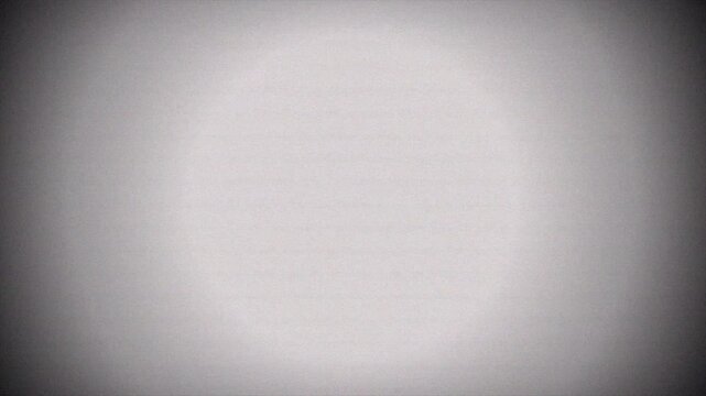 Monochrome static noise pattern on white background, retro film grain effect 4k video