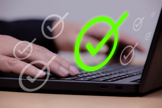 Task completion and approval process. Automated request submission workflow. Checkmark icons. Businessman using laptop computer to manage tasks.