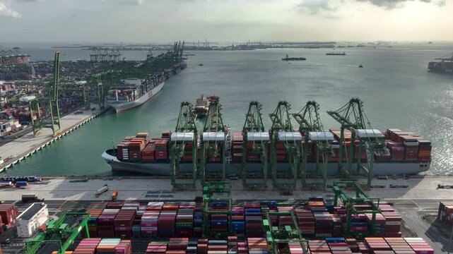 day time singapore city port terminal container ship loading working cranes bay aerial panorama 4k    