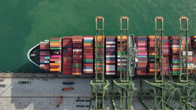 day time singapore city port terminal container ship loading bay aerial topdown panorama 4k    