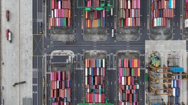 day time flight over singapore city port container terminal traffic bay topdown aerial panorama 4k    