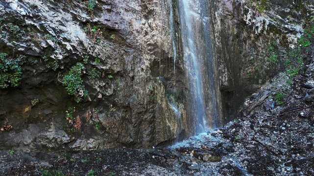 The Mill Creel Valley along the San Andras Fault looking a a Yuhaaviatam Native American Indigenous Sacred waterfall on a Granite face near the Valley of the Falls on the Yucaipa Ridge,