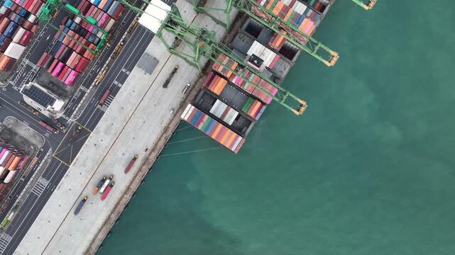 day time singapore city port terminal colorful container ship dock bay aerial topdown panorama 4k    