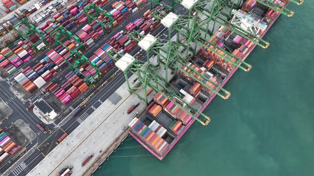day time singapore city port container terminal traffic bay ship loading topdown aerial panorama 4k    