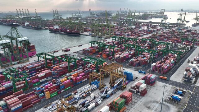 day time flight over singapore city port container ship loading terminal traffic bay aerial panorama 4k    