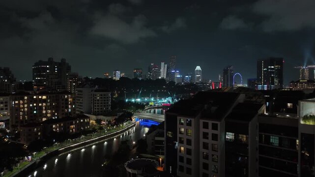 night life time singapore city famous riverside boat quay traffic aerial panorama 4k 