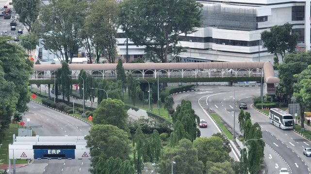 day time singapore city center traffic street road pedestrian walking bridge aerial panorama 4k 