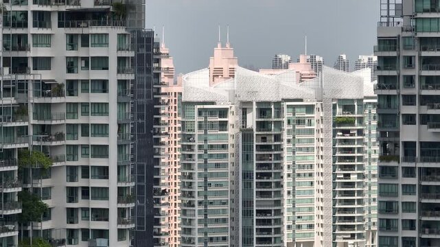 day time singapore city residential apartment buildings balcony front exterior aerial panorama 4k 