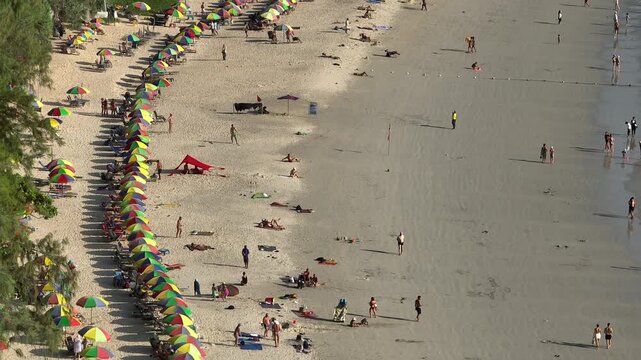 sunny day phuket island famous kata crowded beach bay aerial panorama 4k thailand