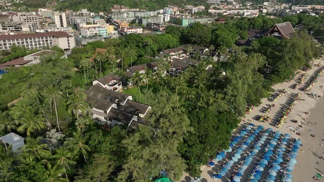 sunny day phuket island famous kata crowded beach bay coastline aerial panorama 4k thailand