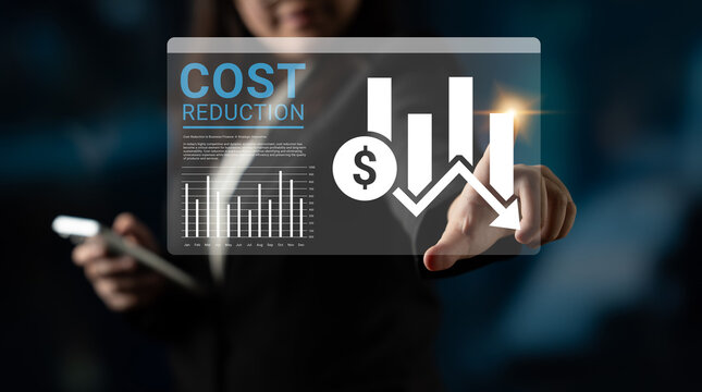A business professional focuses on cost reduction strategies using interactive digital charts showing financial trends and growth indicators, highlighting smart decision-making. Ledger