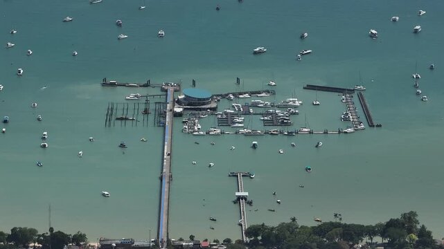 sunny day phuket island bay famous touristic boat traffic pier aerial panorama 4k thailand 
