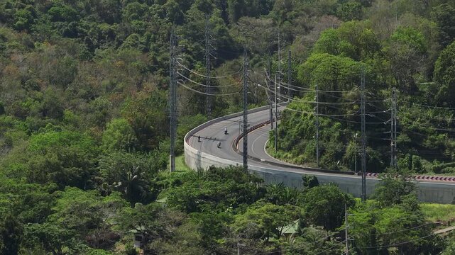 sunny day phuket island traffic mountain road turn aerial panorama 4k thailand 