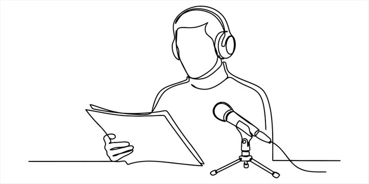 Person with headphones reading script near microphone