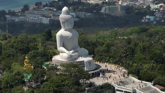 sunny day phuket island famous mountain top crowded square big buddha monument karon bay town aerial panorama 4k thailand