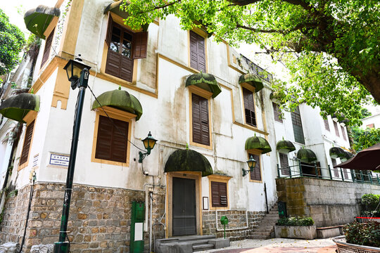 Traditional colonial architecture apartment building facade at historic heritage Lilau Square built in 1900s in Macau