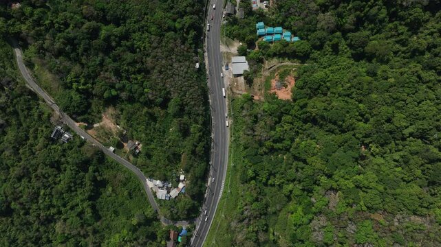 sunny day phuket island traffic mountain road aerial topdown panorama 4k thailand 