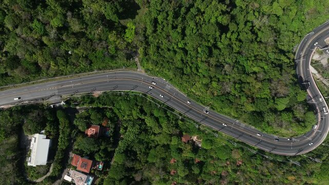 sunny day phuket island traffic mountain road aerial topdown panorama 4k thailand 