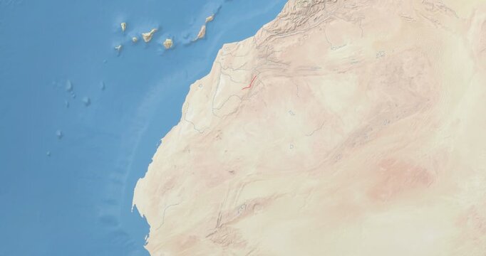Western Sahara on Globe. Zoom into the country with Earth spinning on dark background. Physical world map with Western Sahara and label on it. Country view animation.