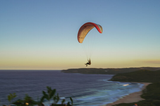 paraglider over the sea