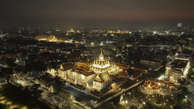 sunset sky night illumination bangkok city traffic street temple square democracy monument aerial panorama 4k timelapse thailand