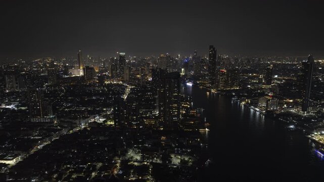 night time illumination bangkok city traffic river famous ferris wheel asiatique bay park aerial panorama 4k timelapse thailand