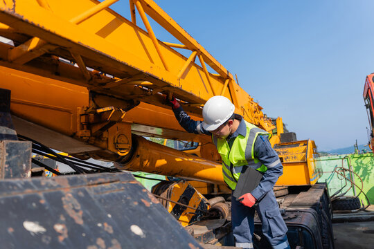 Examining crane machinery construction safety compliance