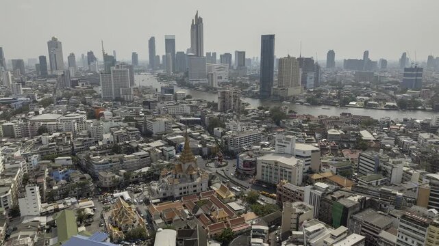 day time flight over bangkok city center riverside aerial panorama 4k timelapse thailand