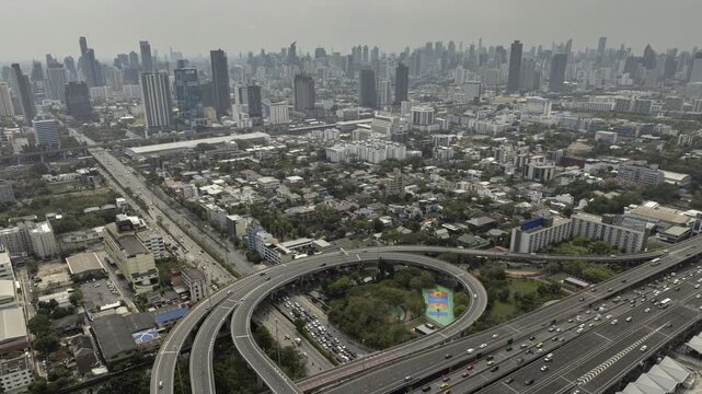 sunny day bangkok city traffic street road interchange aerial panorama 4k timelapse thailand 
