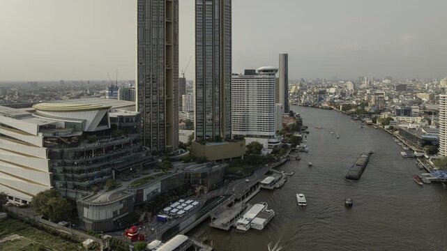day time bangkok city famous modern mall area riverside traffic aerial panorama 4k timelapse thailand 