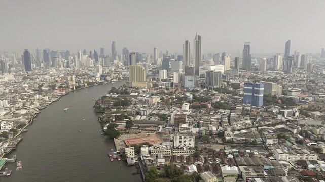 cloudy day smog bangkok cityscape riverside traffic aerial panorama 4k timelapse thailand  