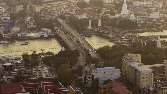 sunset time bangkok city famous temple river traffic bridge aerial panorama 4k timelapse thailand  