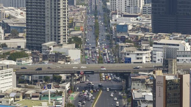 day time smog flight over bangkok city center traffic street road overpass aerial panorama 4k timelapse thailand  