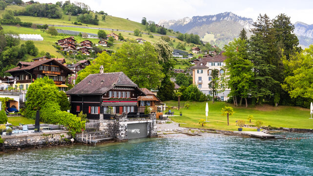 Spiez village constructing houses on Lake Thun shore