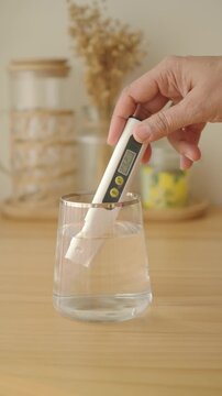 Measuring water temperature with a digital thermometer