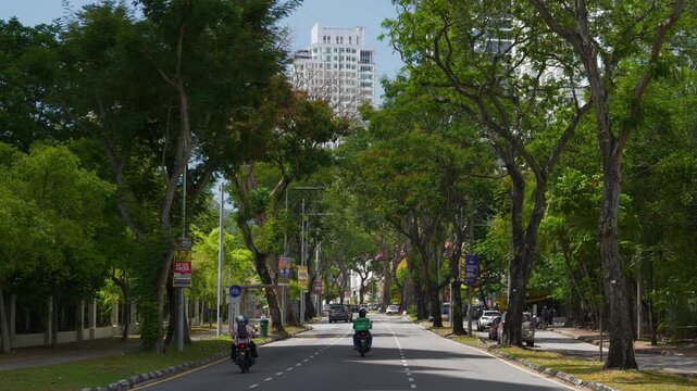 sunny day time penang island george town city center traffic street alley slow motion panorama 4k malaysia