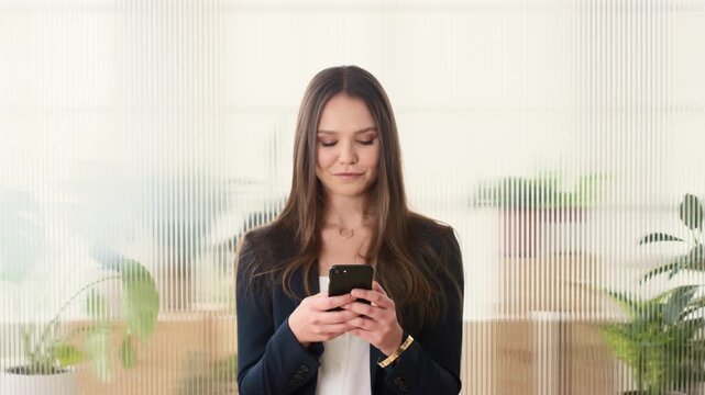 Review, text or woman in office with phone, funding request or pitch response in green startup. Eco, space or esg advisor with tech, investment inquiry or proposal feedback in sustainable business.