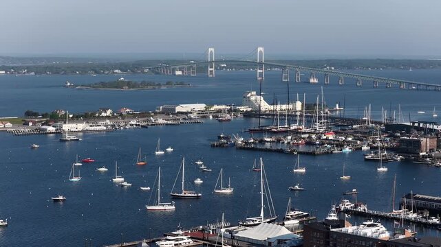 Newport, Rhode Island, USA - aerial view of harbor, sailboats and Claiborne Pell Bridge on a clear day. g.