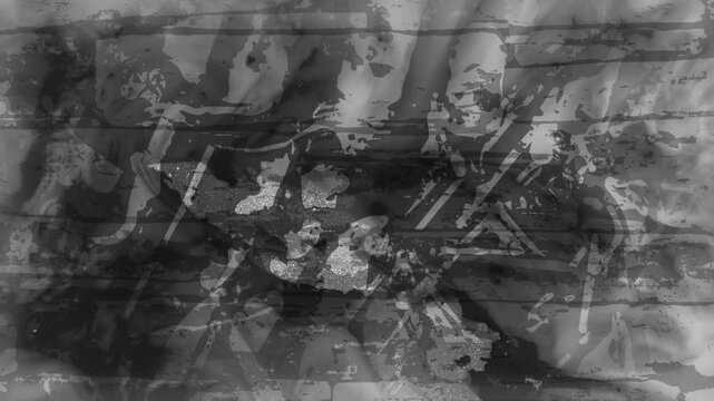 Abstract dynamic grey background with grunge texture, chaotic pattern and digital noise, black and grey wall. looped video.