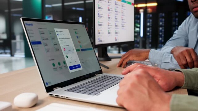 HR Managers Reviewing Payroll Software Data