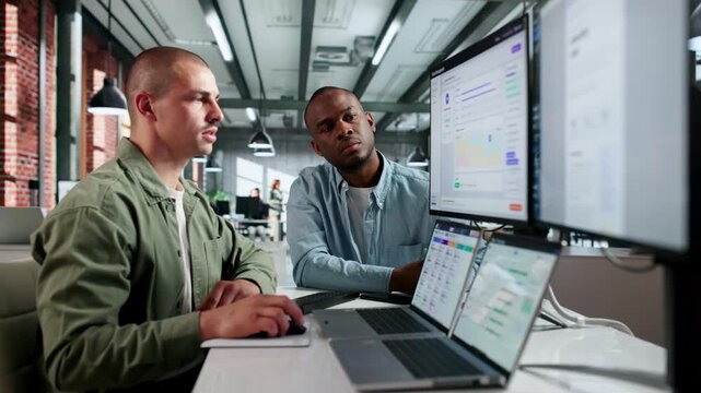 Human Resources Manager Discusses Employee Performance Using Software