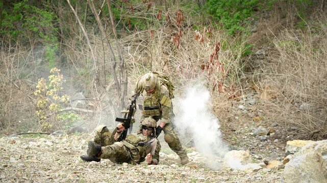 Military rescue operation battlefield action photography warzone ground level teamwork and courage
