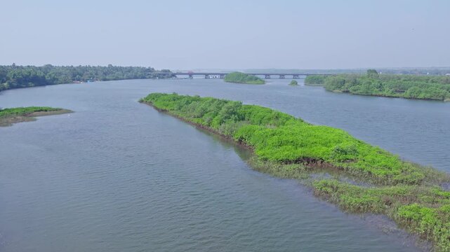 Aerial view of Sharavati coastal river near Honnavar surrounded by lush vegetated islands