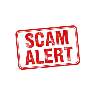 Red stamp warning of scam alert