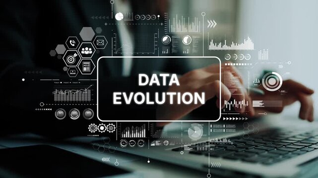 Business professional typing on laptop with overlay graphics showcasing data evolution and analytics concepts. Asymptotic smart data analytic.