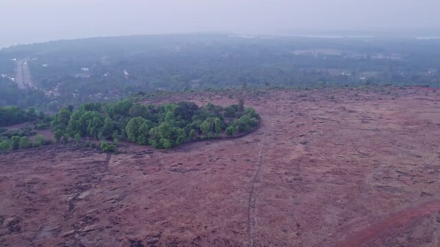 Drone view of lush greenery hills showcasing peaceful natural landscape and scenic outdoor beauty