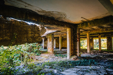 Ruined interior of the abandoned Savane Sanatorium in Tskaltubo, Georgia, where nature slowly reclaims a Soviet-era landmark. © Pernelle Voyage
